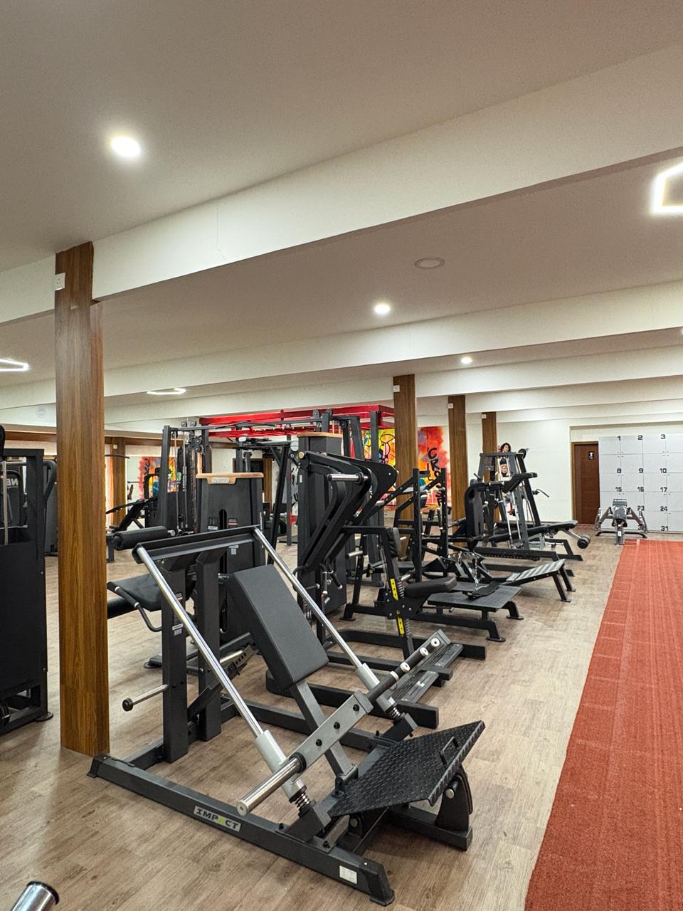 Inside Liger Fitness Vellimadukunnu - training area and premium equipment